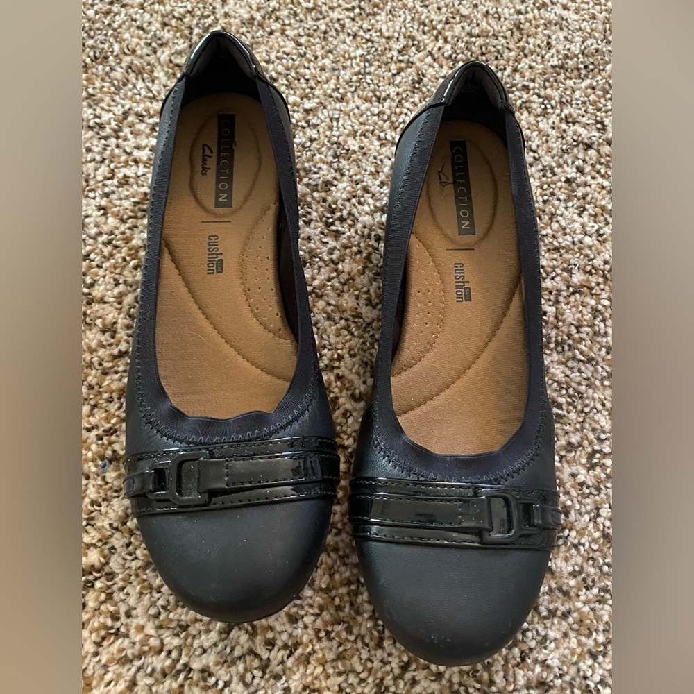 Clarks brand slip-on shoes, size 6 1/2, black.